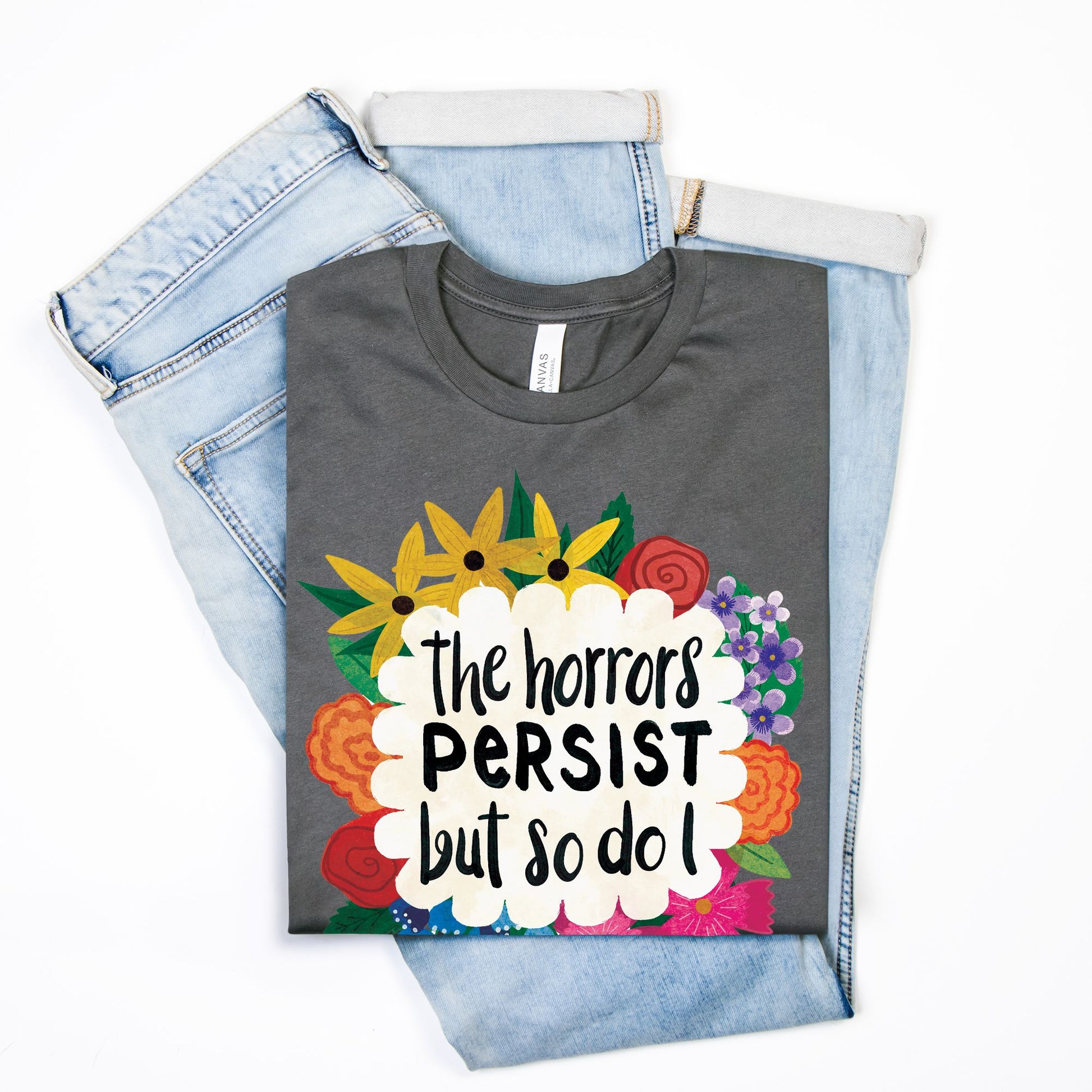 Gray t-shirt with colorful floral design and text on a white background